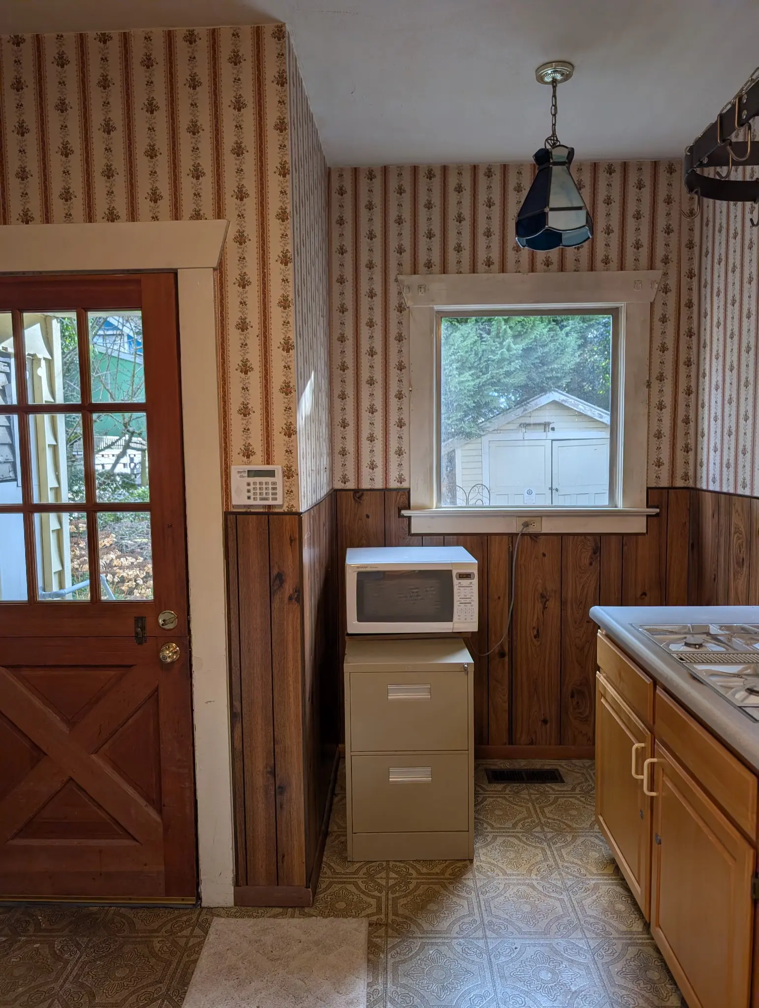 Original kitchen cabinetry before work began