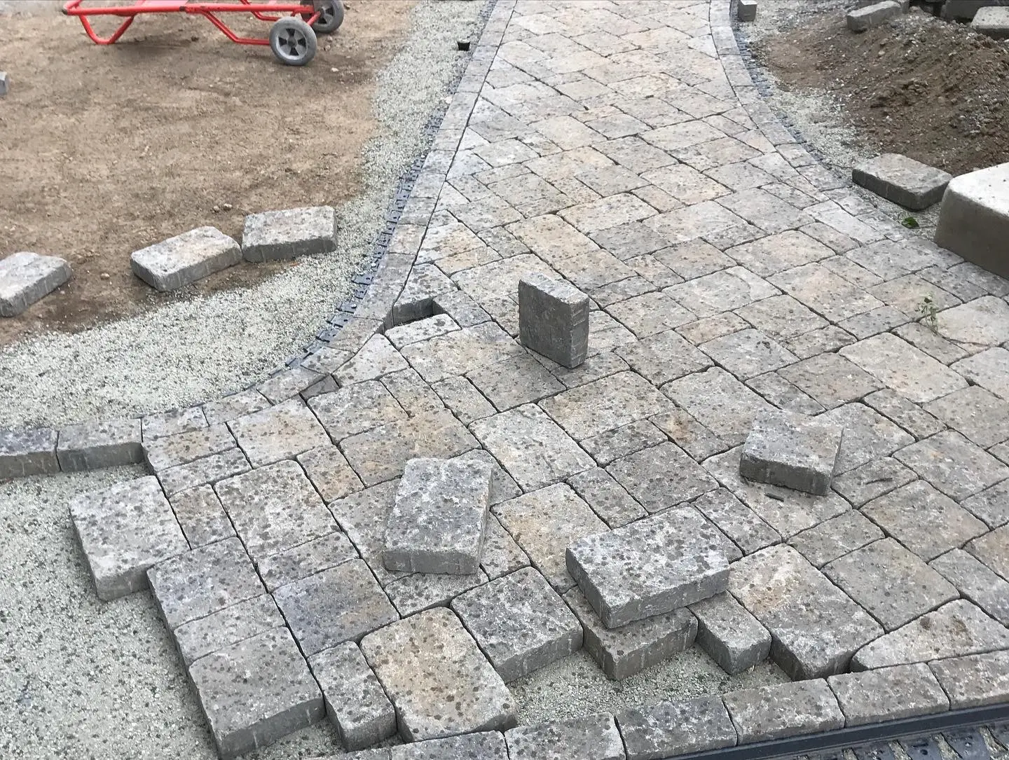 Paver path being laid