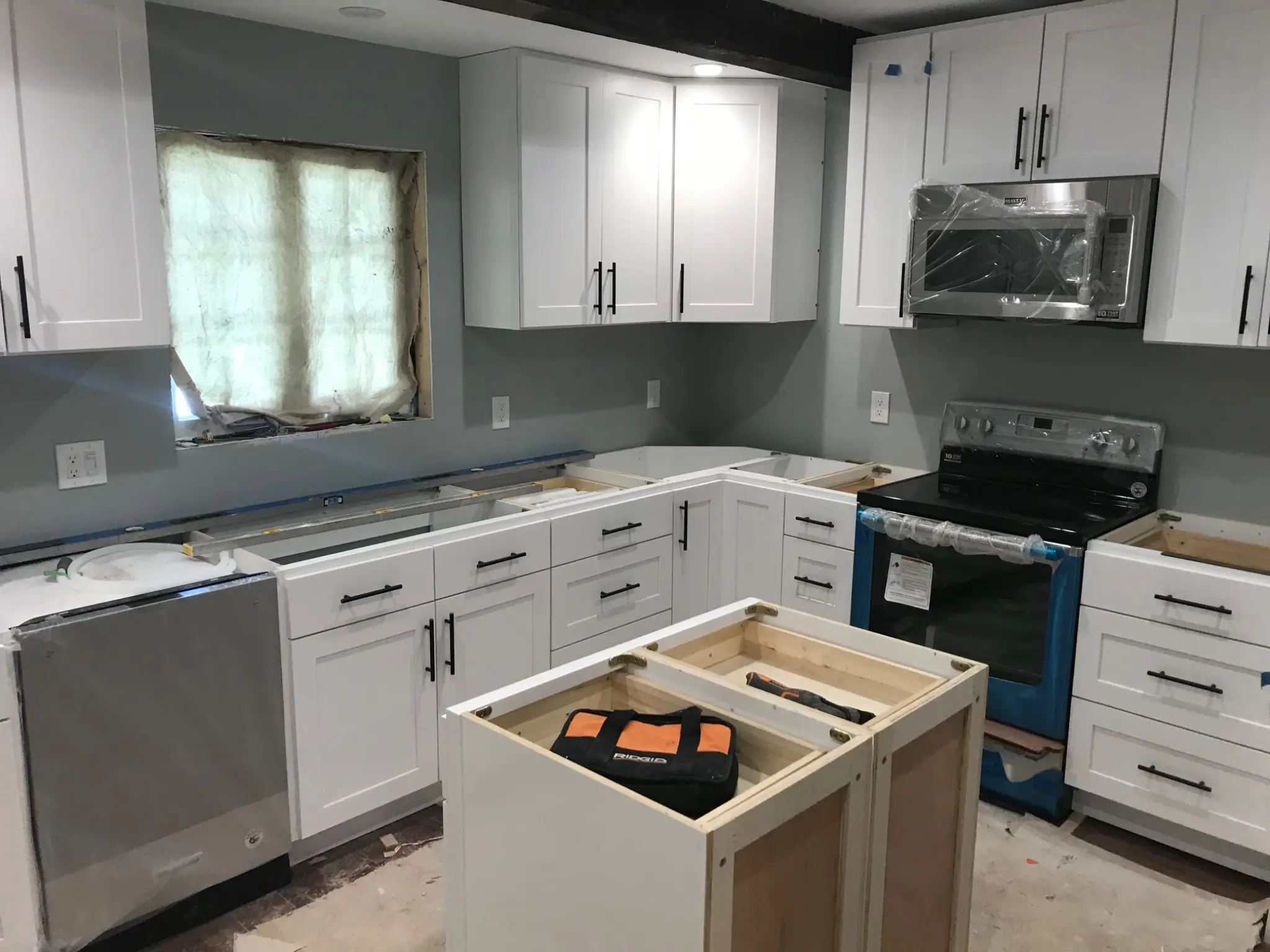 Kitchen cabinetry during installation