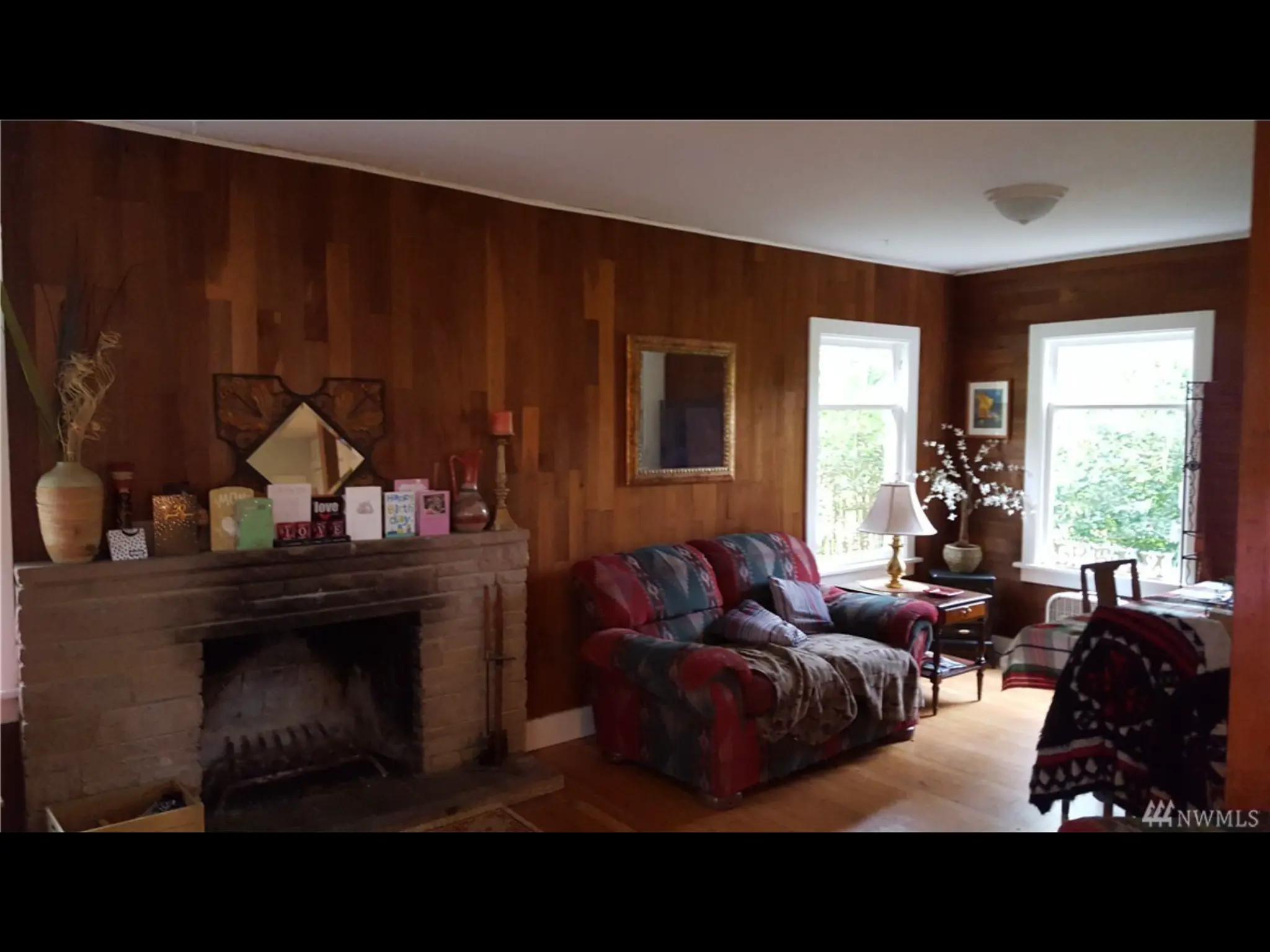 Original fireplace and living room finishes