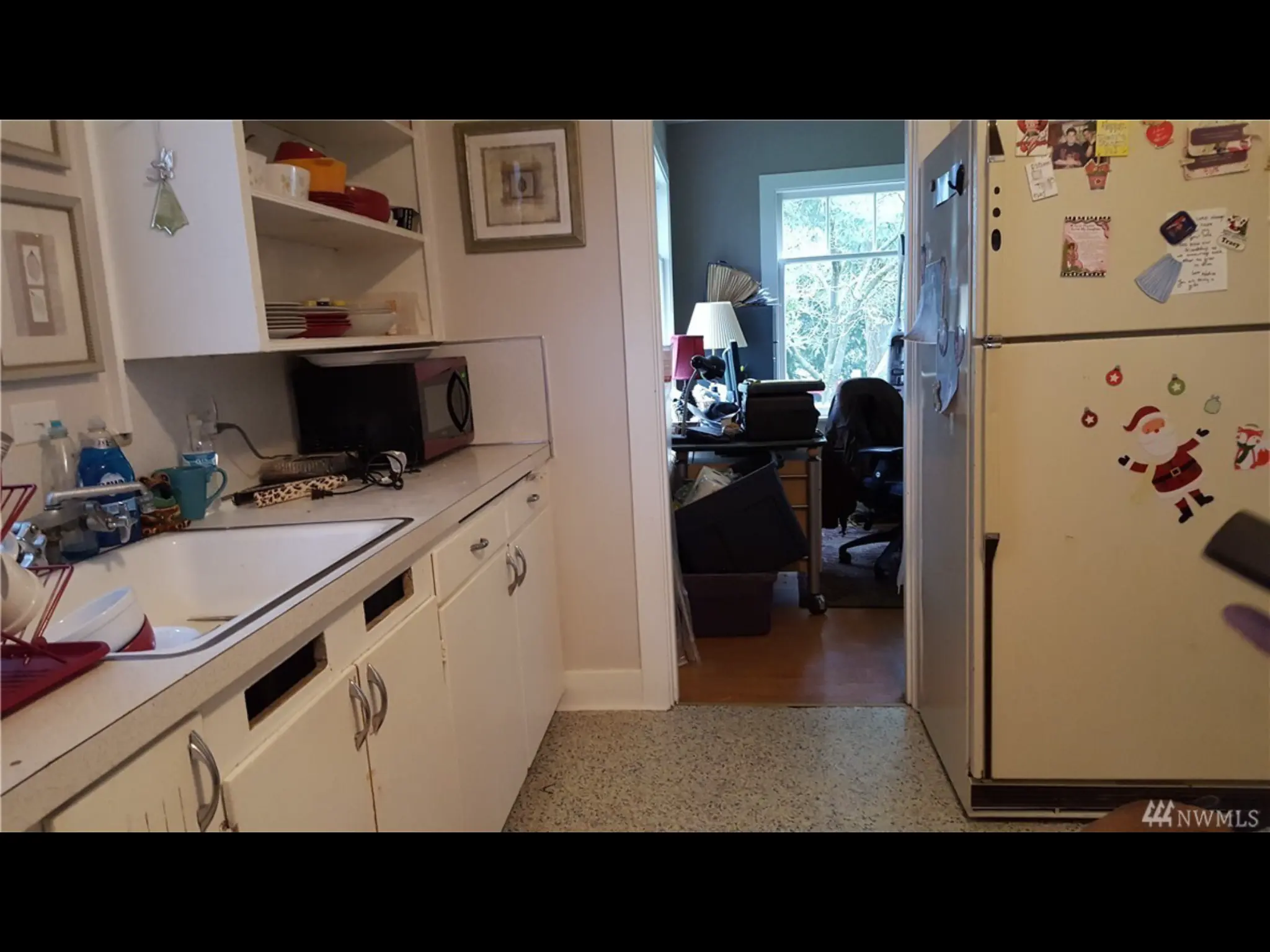 Original kitchen and adjoining room