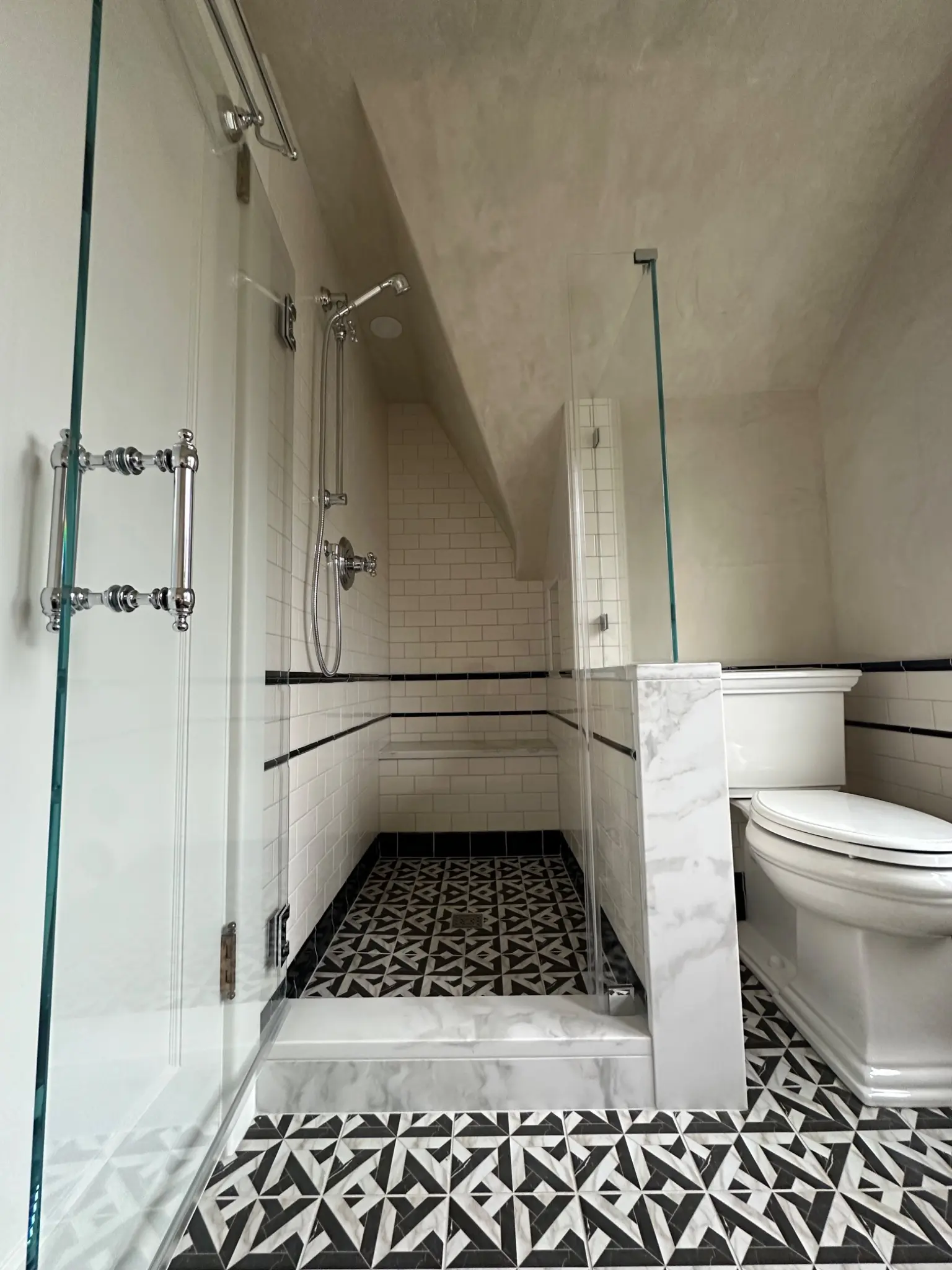 Completed upstairs shower and patterned floor