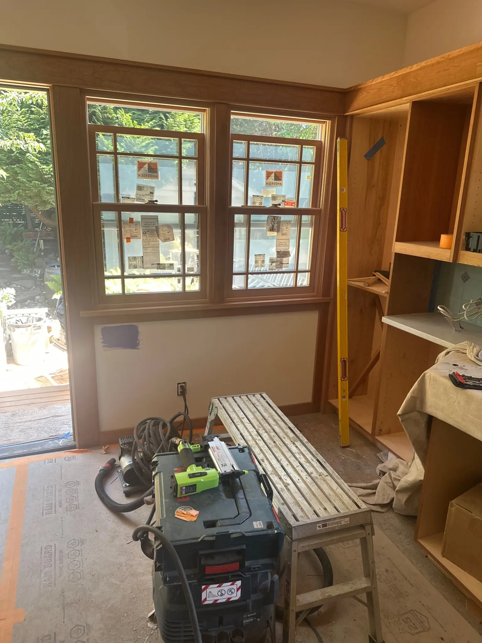 Kitchen cabinetry and window trim during installation
