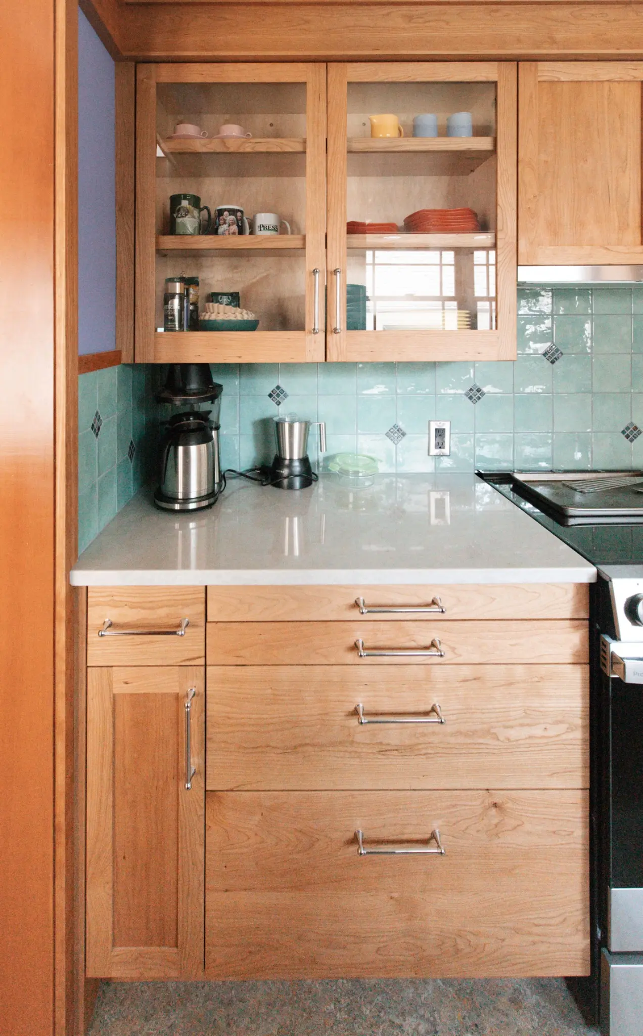 Custom kitchen drawer and upper cabinet detail