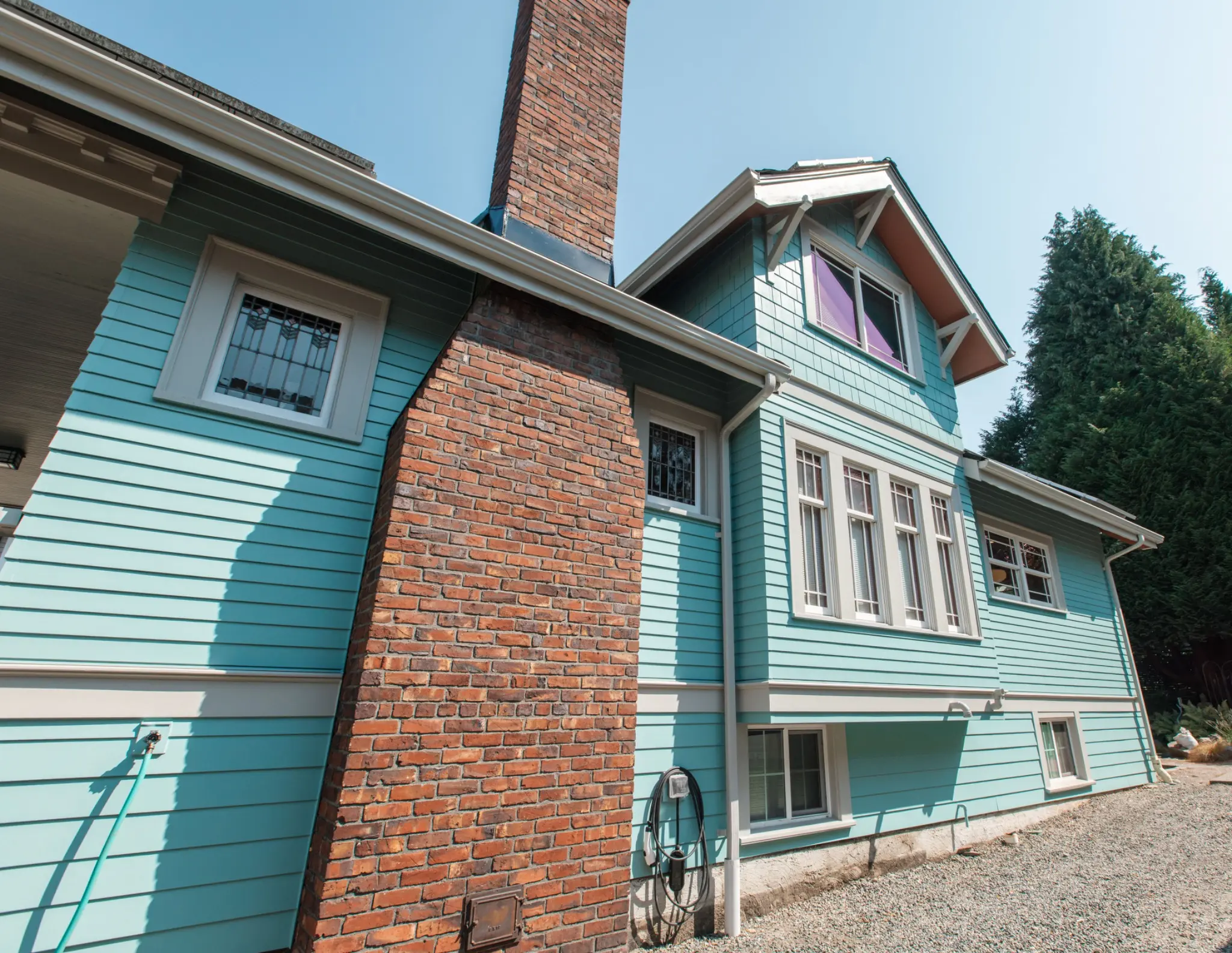 Completed side exterior with restored period detailing