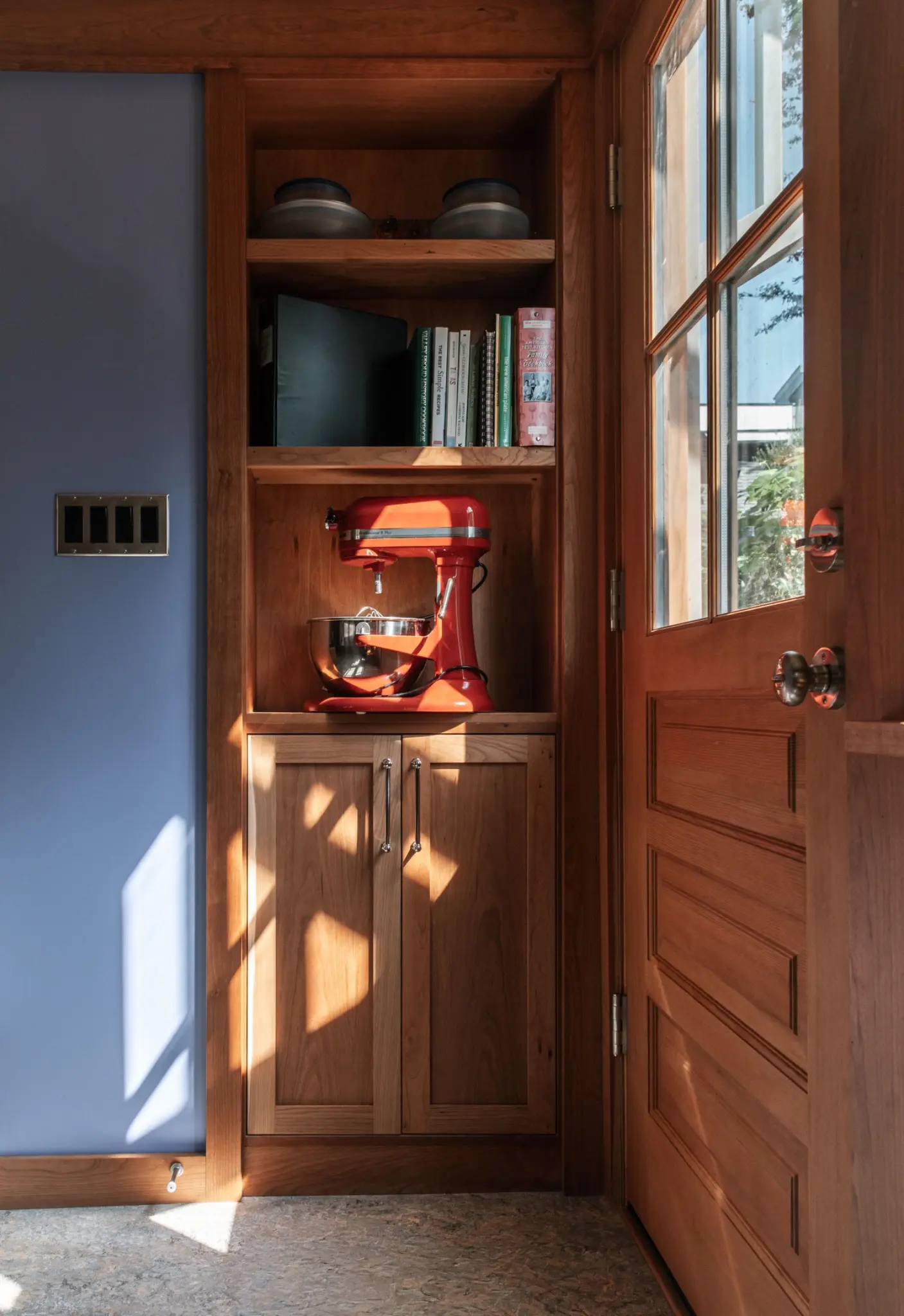 Built-in cabinet detail beside the rear door