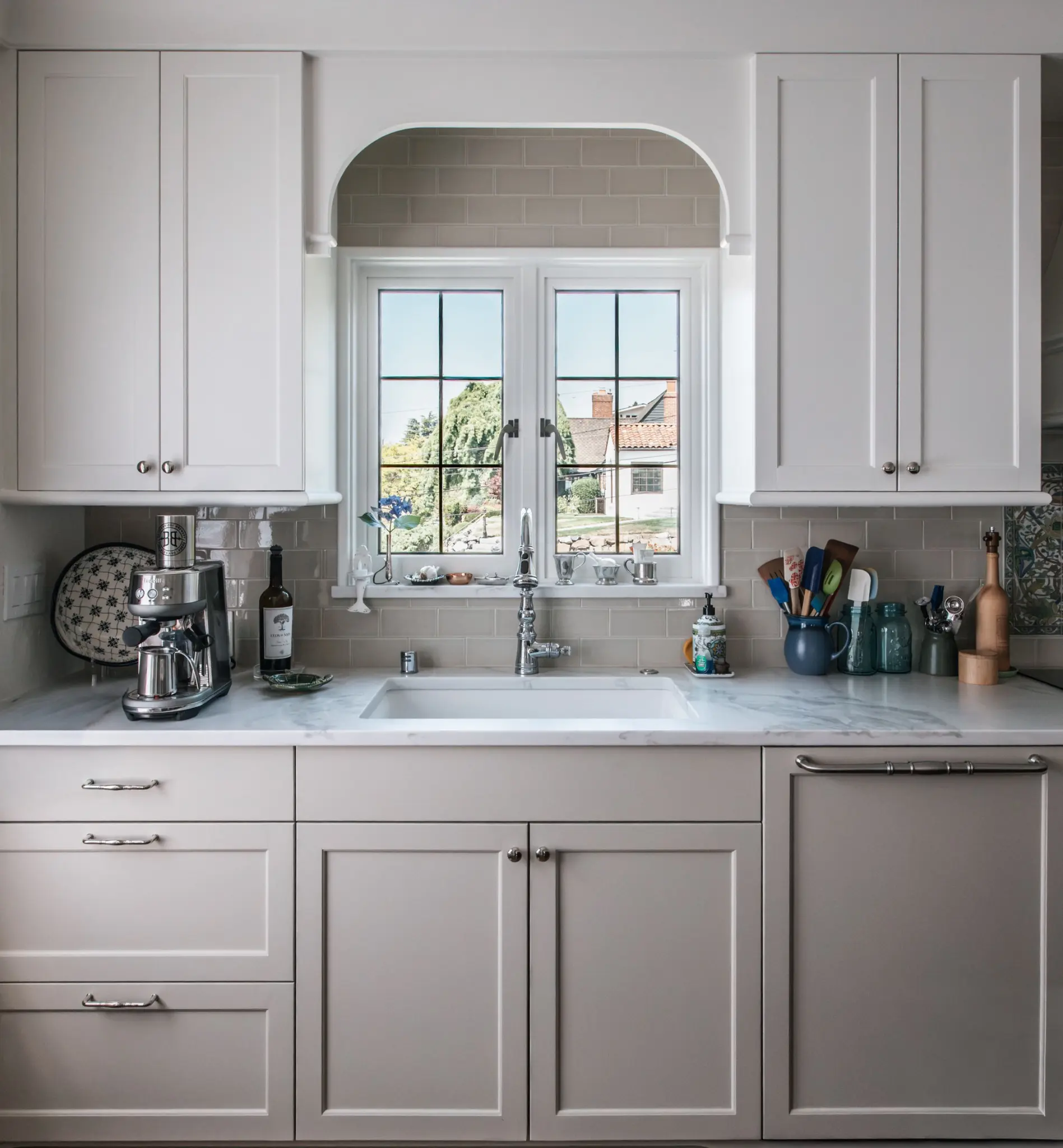 Completed sink wall and arched cabinet detail