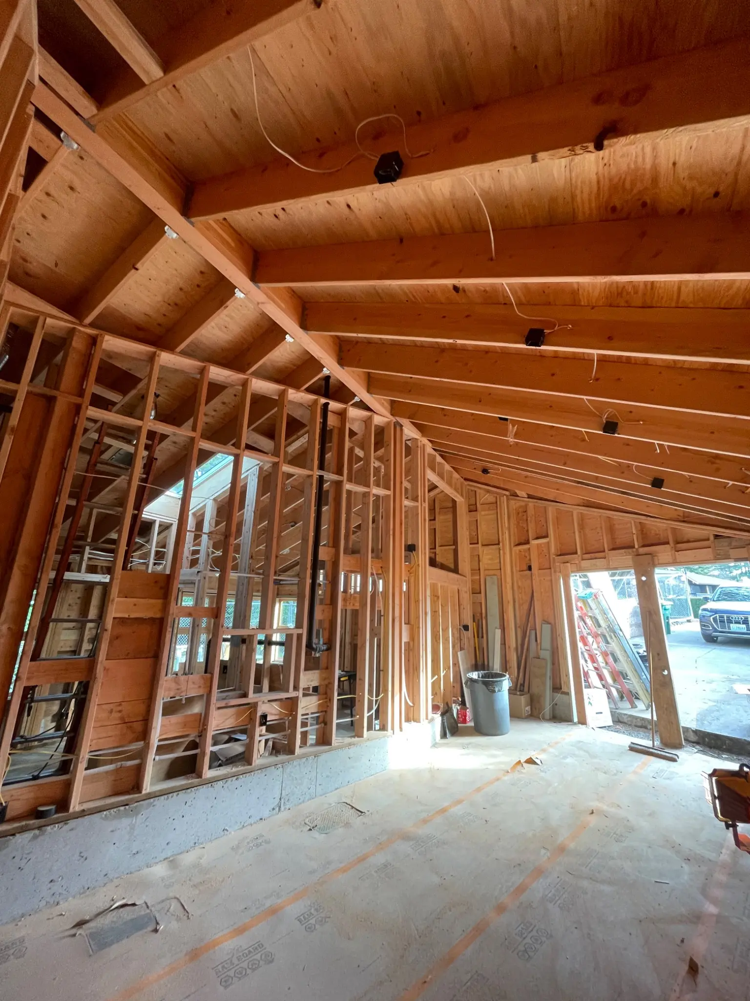 Complex angled roof framing on a residential addition